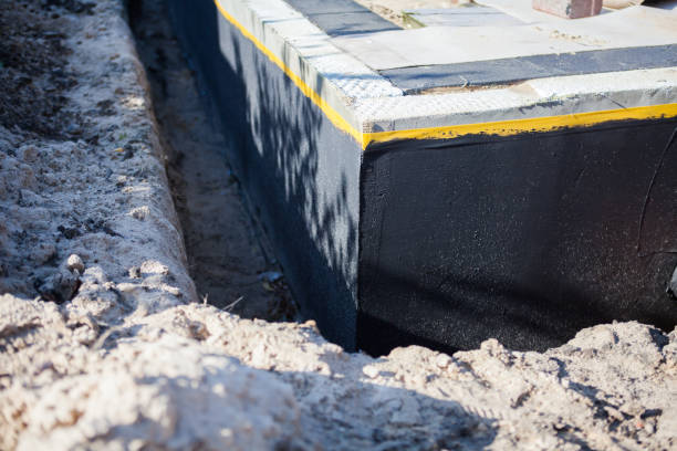 Professional Waterproofing technician working in Reeseville, WI